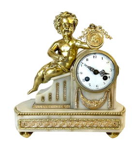 Late 19th century French White Marble and Gilt Bronze Figural Mantel Clock: Late 19th century French White Marble and Gilt Bronze Figural Mantel Clock The gilt bronze drum case surmounted by a bronze figure of a cherub in the manner of Henri Dasson the painted white enamelled