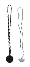 Pair of Chinese Carved Pendant Necklaces – Black Jade Bi Disc & White Jade Butterfly