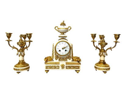 Antique French 19th Century Gilt Bronze Mantle Clock Set: Antique French 19th Century Gilt Bronze Mantle Clock Set Clock Measure 14"in H x 9"in W x 4"in D Candelabra Measure 10"in H x 4"in diameter