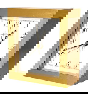 Tiffany & Co. Swiss Brass Desk Clock with Swiza Quartz Movement: Elegant Tiffany & Co. Swiss-made desk clock in a brushed brass case with crisp white dial, black Arabic numerals, and black hands. Powered by a Swiza Quartz 04 movement, visible on the back, and marke