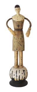 Primitive Folk Art-Style Wooden Figure on Ball Pedestal: This charming hand-crafted wooden figure captures the spirit of primitive folk art with its stylized form, distressed finish, and whimsical character. The figure stands atop a painted ball pedestal an
