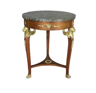 19th Century French Empire Style Mahogany Gueridon Table with Marble Top and Ormolu Mounts: Exceptional 19th century French Empire style gueridon table crafted from rich mahogany and topped with a finely veined green marble surface. This neoclassical round table is adorned with exquisite gil