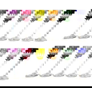 Set of 12 Baccarat Cut-to-Clear Crystal Cordial Glasses, Multi-Color: Exceptional set of 12 Baccarat cut-to-clear crystal cordial or liqueur glasses, each in a vibrant jewel-tone color including amethyst, ruby, chartreuse, amber, emerald, and cobalt. Each glass features