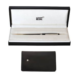 Montblanc Meisterstuck Platinum-Coated Ballpoint Pen with Box & Leather Case: A classic Montblanc Meisterstuck ballpoint pen featuring a sleek black resin body with platinum-coated fittings. The iconic white star emblem adorns the cap, and the pen is engraved with “Meisterstu