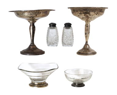 Lot of 6 Marked Sterling Silver & Glass Tableware Pieces – Compotes, Bowls, Shakers: Refined lot of six vintage tableware items, each featuring marked sterling silver components paired with elegant glasswork. This versatile collection includes: 2 sterling silver footed compotes with c