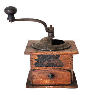 Antique Arcade Coffee Grinder – Cast Iron & Wood Mill, Freeport Illinois: Authentic late 19th to early 20th century hand-crank coffee grinder made by Arcade Manufacturing Co., Freeport, IL. This charming piece features a cast iron grinding mechanism mounted on a dovetailed