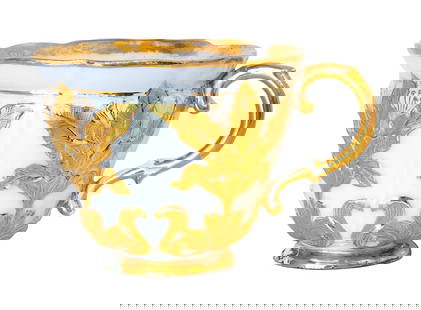 Meissen Porcelain Cup with Raised Gilt Acanthus Decoration: This exquisite porcelain cup is a product of the renowned Meissen manufactory, Germany’s oldest and most prestigious porcelain producer. The cup features a delicately fluted body with high-relief ac