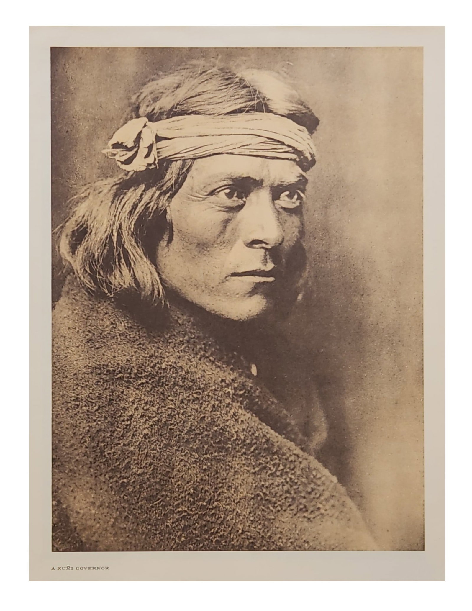 Edward Sheriff Curtis (1868 - 1952) American: Edward Sheriff Curtis (1868 - 1952) American Title: A Zuni Governor Print Caption Date: 1925 Measure 15 1/2"in H x 11 1/2"in W and 25 1/2"in H x 21"in W with frame This portrait may well be taken as r