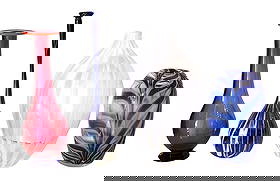 Set of 4 Art Glass Vases, Including Orrefors Sweden: Collection of four decorative art glass vases in various shapes and colors. Includes: One signed Orrefors Sweden vase in cranberry red with flared rim and cobalt base. One tall, narrow-neck vase in co