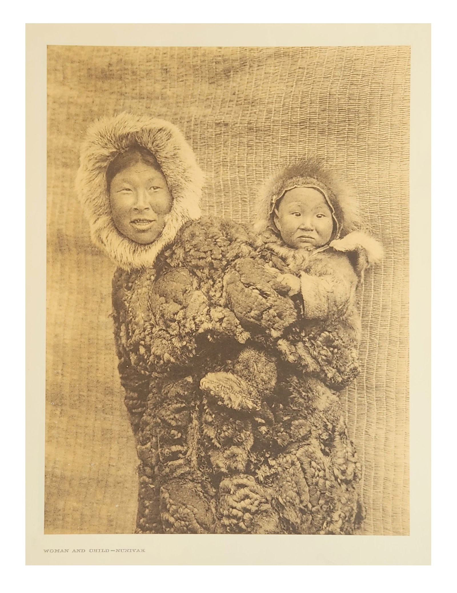 Edward Sheriff Curtis (1868 - 1952) American: Edward Sheriff Curtis (1868 - 1952) American Title: Woman and Child - Nunivak Print Caption - Engraving Date: 1928 Measure 18"in H x 13"in W no framed <b