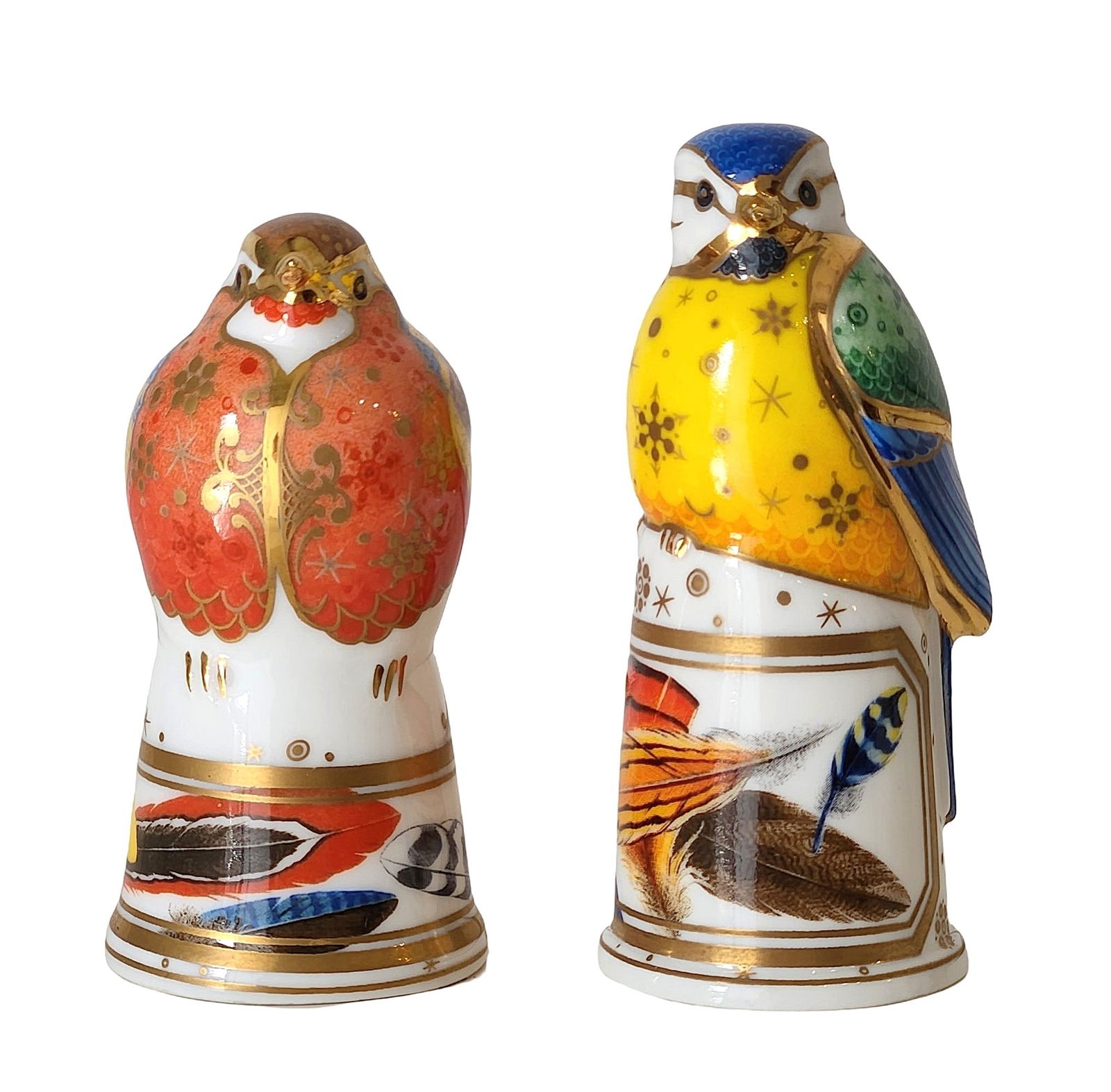 Pair of Royal Worcester Fine Bone China Birds, “Robin" & “Blue Tit" from the Connoisseur: Striking pair of fine bone china bird figurines by Royal Worcester, from The Connoisseur Collection. Includes “Robin” (1999) and a vibrantly painted Blue Tit, both richly decorated in vivid en