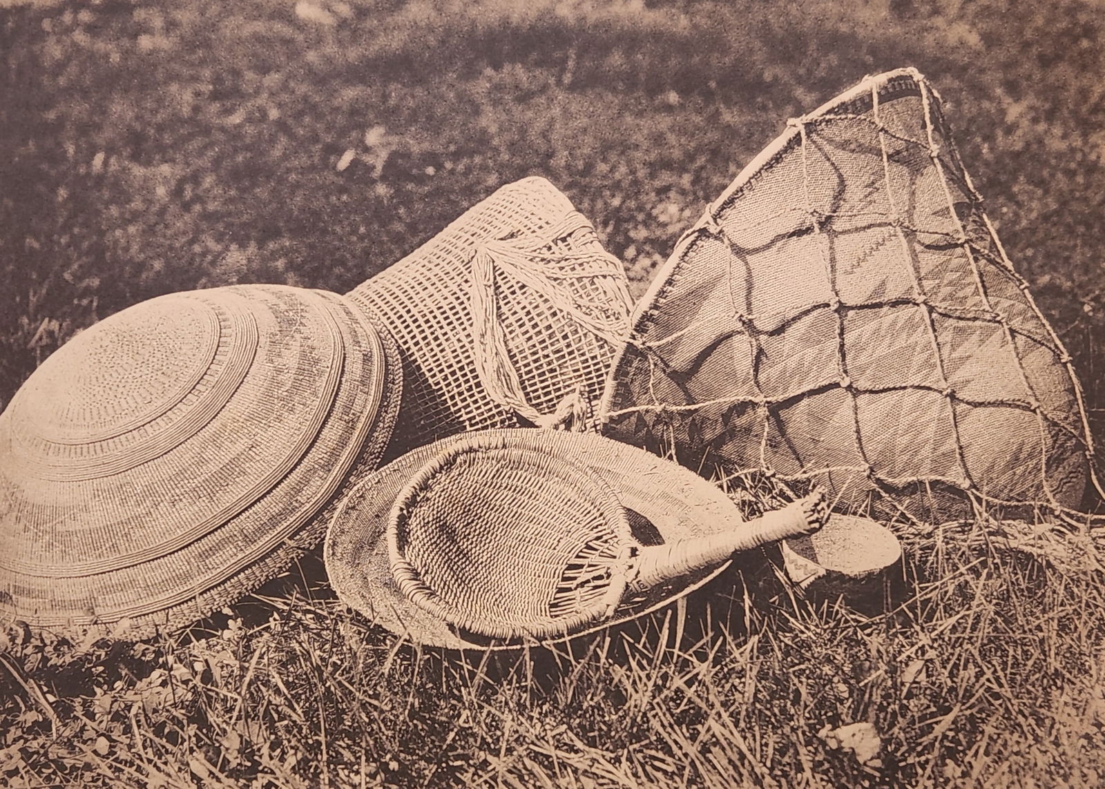 Edward Sheriff Curtis (1868 - 1952) American: Edward Sheriff Curtis (1868 - 1952) American Title: Pomo Seed-Gathering Utensils Print Caption - Engraving Date: 1924 Measure 13"in H x 18"in W no framed The group includes a tight-mesh