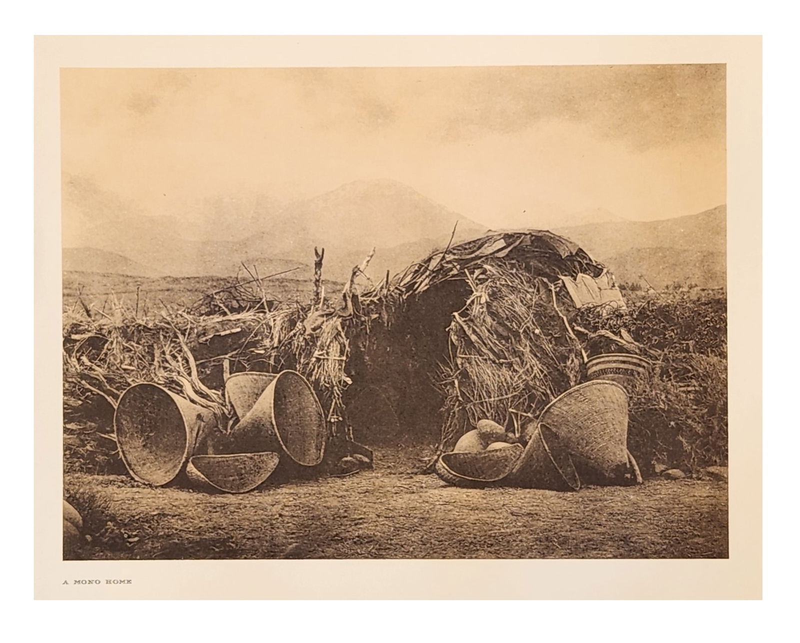 Edward Sheriff Curtis (1868 - 1952) American: Edward Sheriff Curtis (1868 - 1952) American Title: A Mono Home Date: 1924 Print Caption - Engraving Measure 13"in H x 18"in W The Mono inhabit east-central California from Owens l