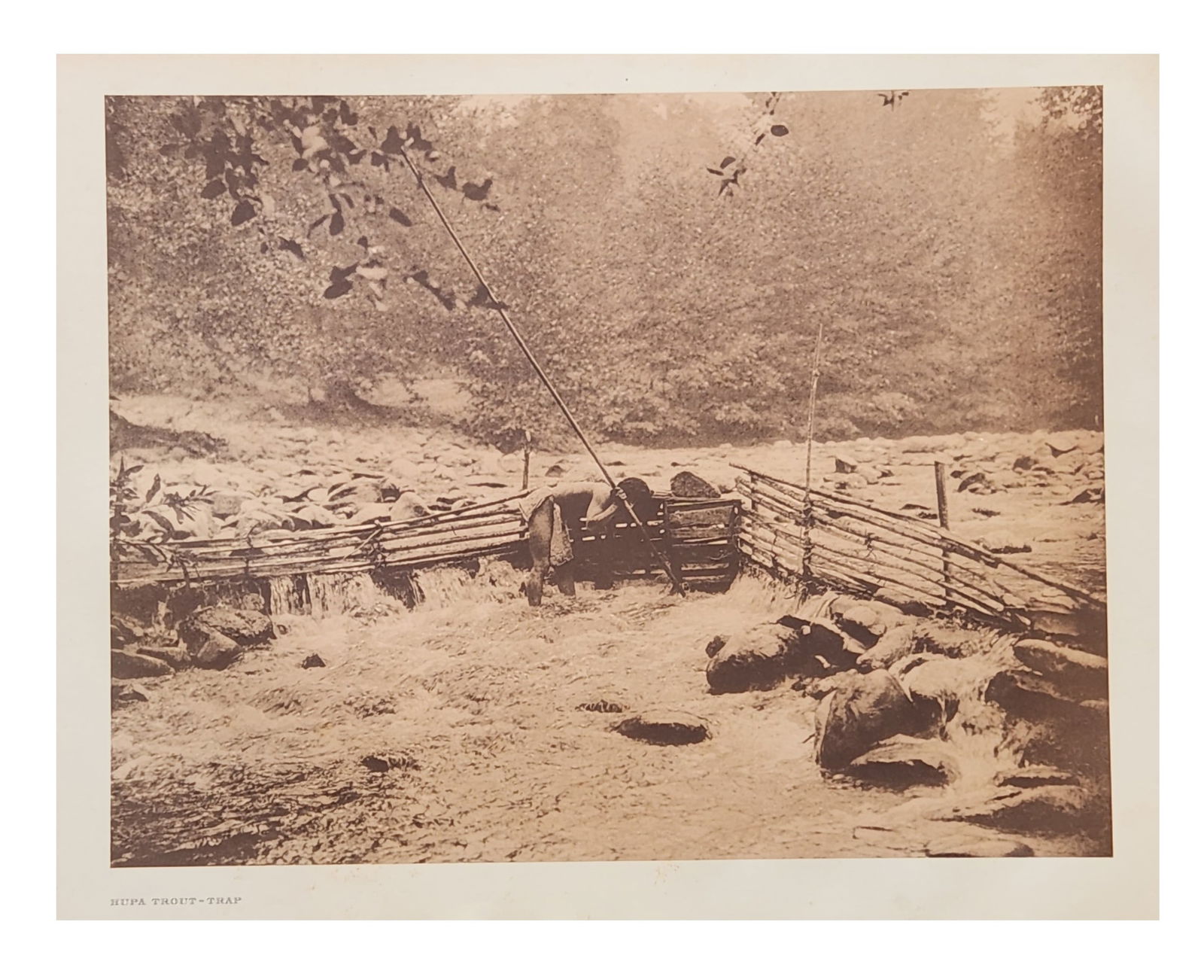 Edward Sheriff Curtis (1868 - 1952) American: Edward Sheriff Curtis (1868 - 1952) American Title: Hupa Trout-Trap Print Caption - Engraving Date: 1923 Measure 13"in H x 18"in W no framed