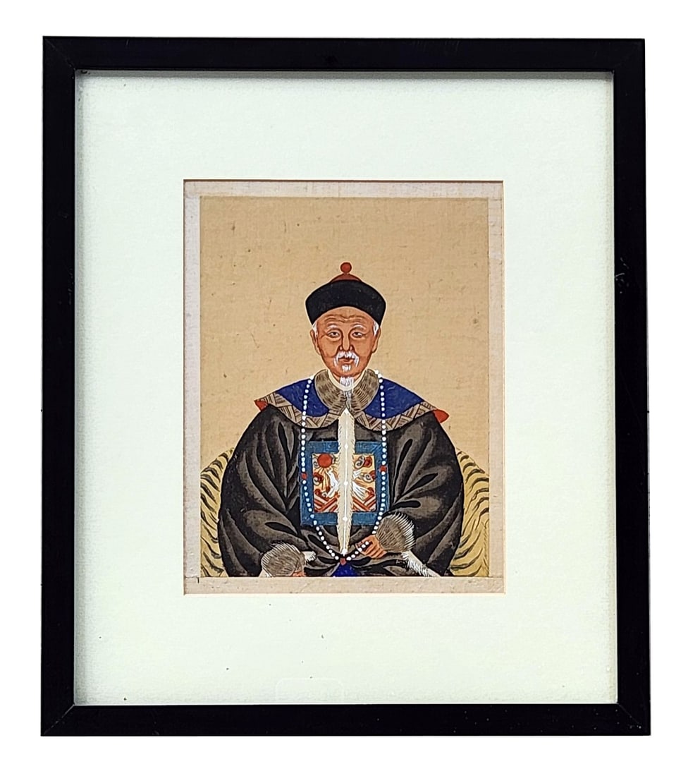 Chinese Ancestor Portrait of a Mandarin Official, Gouache on Silk: Finely executed Chinese ancestor portrait depicting an elderly Mandarin official seated in a frontal pose, wearing a black robe with fur-lined cuffs, a blue embroidered rank badge featuring a crane (s