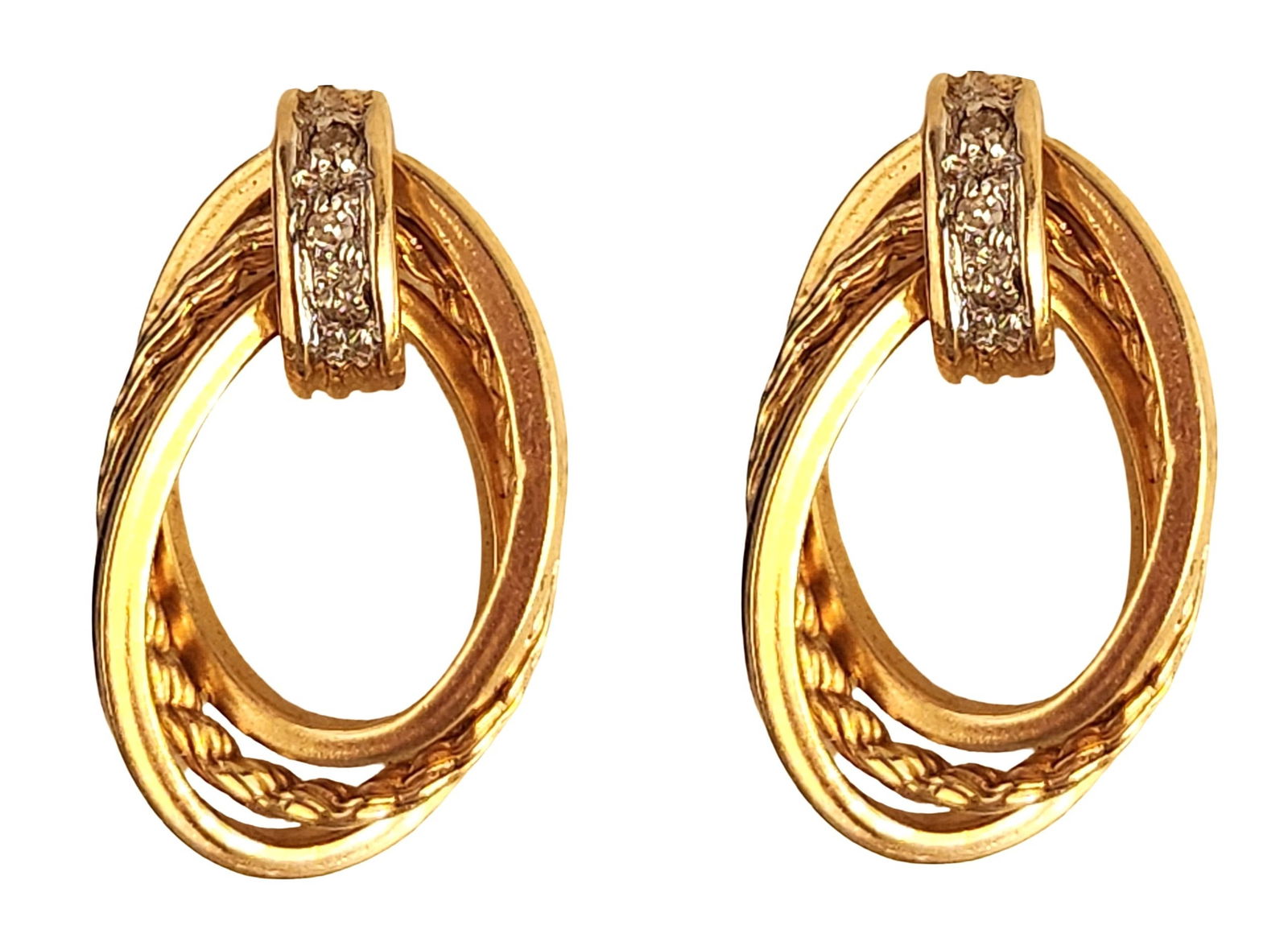 Pair of 14K Gold and Diamond Oval Earrings: Pair of elegant 14K yellow gold earrings designed in an oval form with layered, textured gold elements. Each earring features a diamond-accented hinged top, set with small round diamonds adding subtle