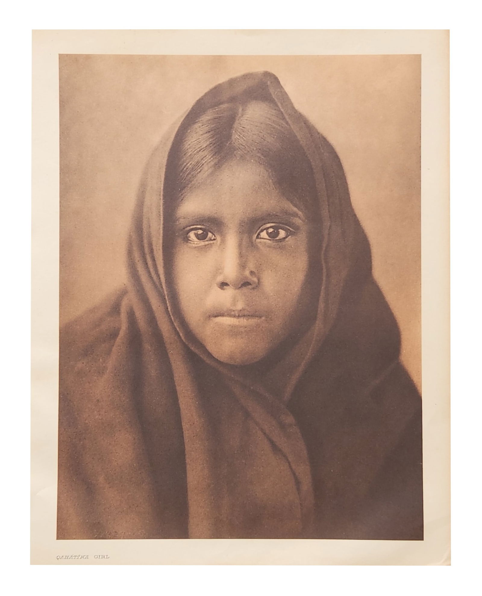 Edward Sheriff Curtis (1868 - 1952) American: Edward Sheriff Curtis (1868 - 1952) American Title: Qahatika Girl Print Caption - Engraving Date: 1907 Measure 18"in H x 13"in W no framed