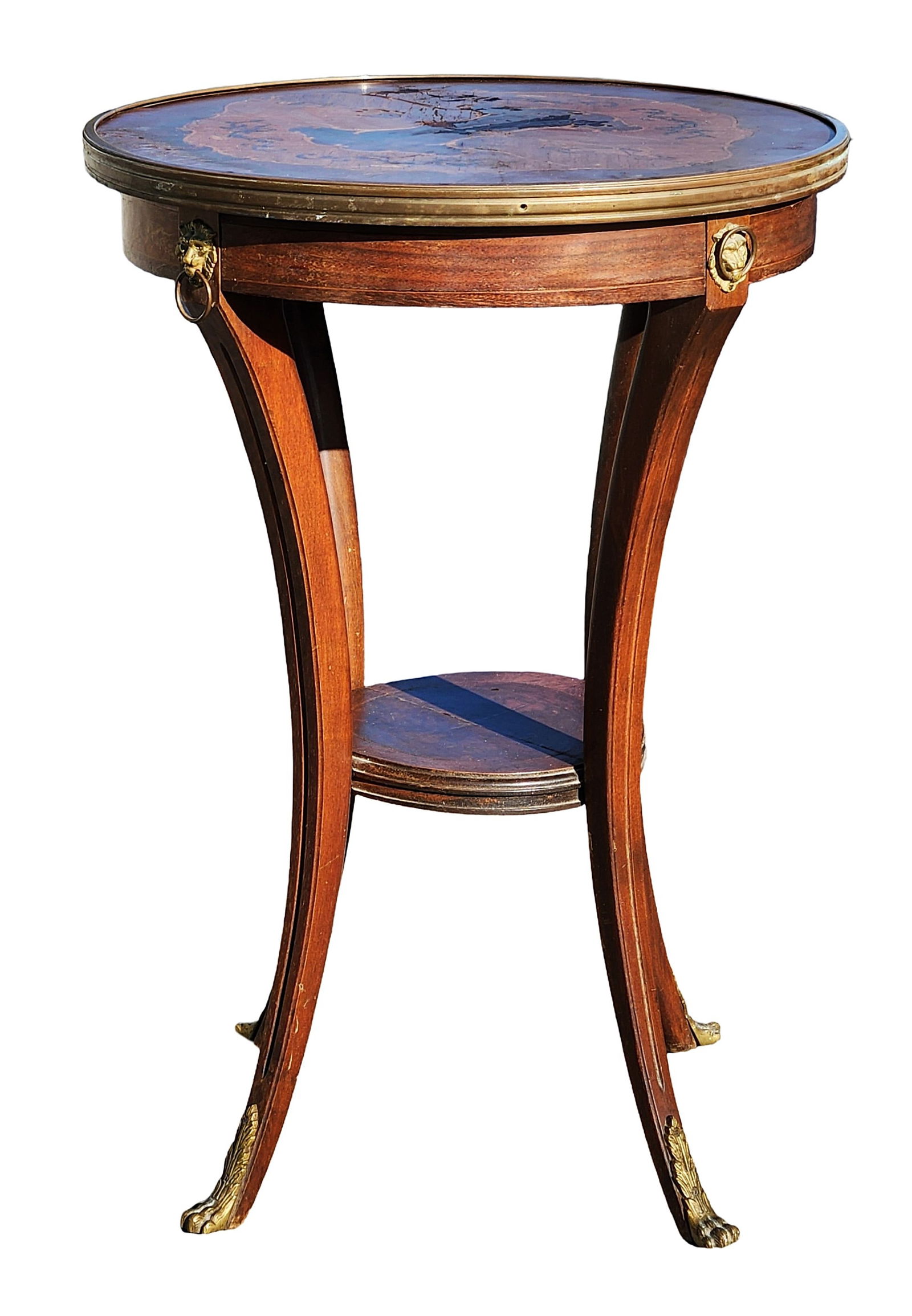 Antique French Style Mahogany Gueridon Table with Inlaid Top & Gilt Bronze Mounts: Elegant antique French-style gueridon table, crafted from richly toned mahogany with a finely inlaid circular top depicting a figural and foliate motif. The tabletop is framed by a brass gallery edge,