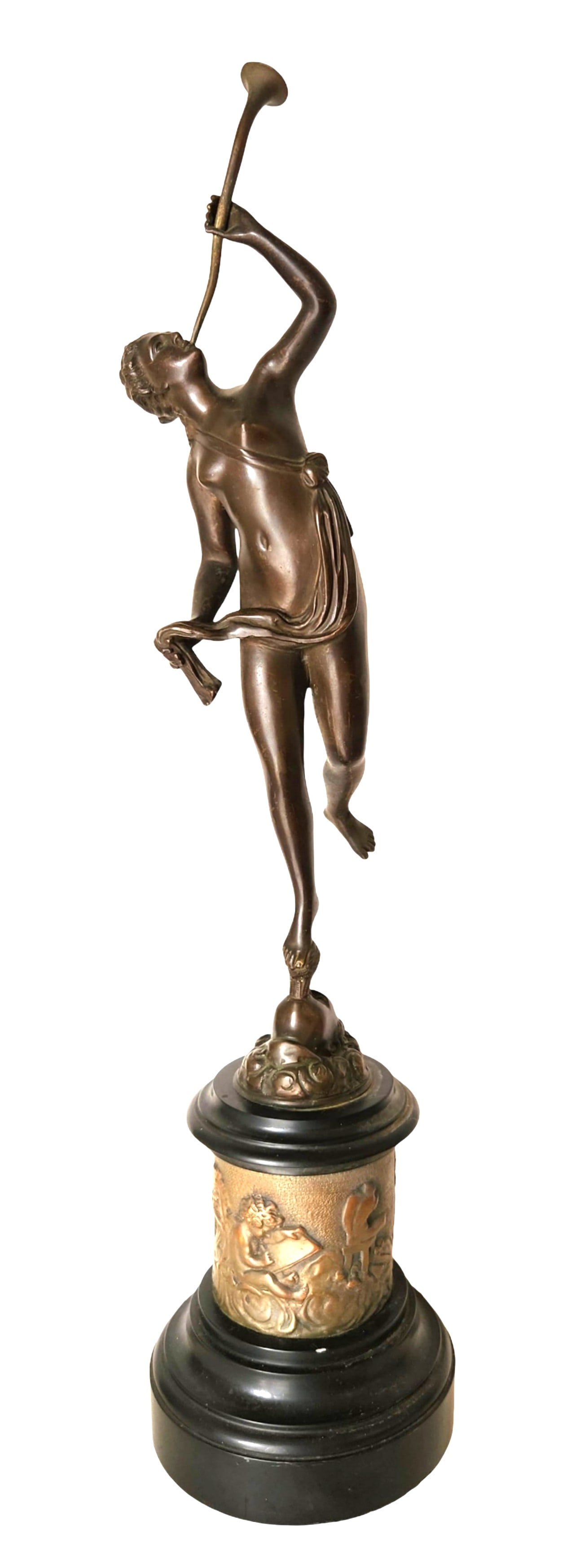 Antique French Bronze Allegorical Trumpet Player Sculpture on Relief Base: Striking antique French bronze sculpture of an allegorical female trumpet player, poised in a dramatic upward gesture, standing gracefully on one leg atop a stylized wave or cloud formation. The figur