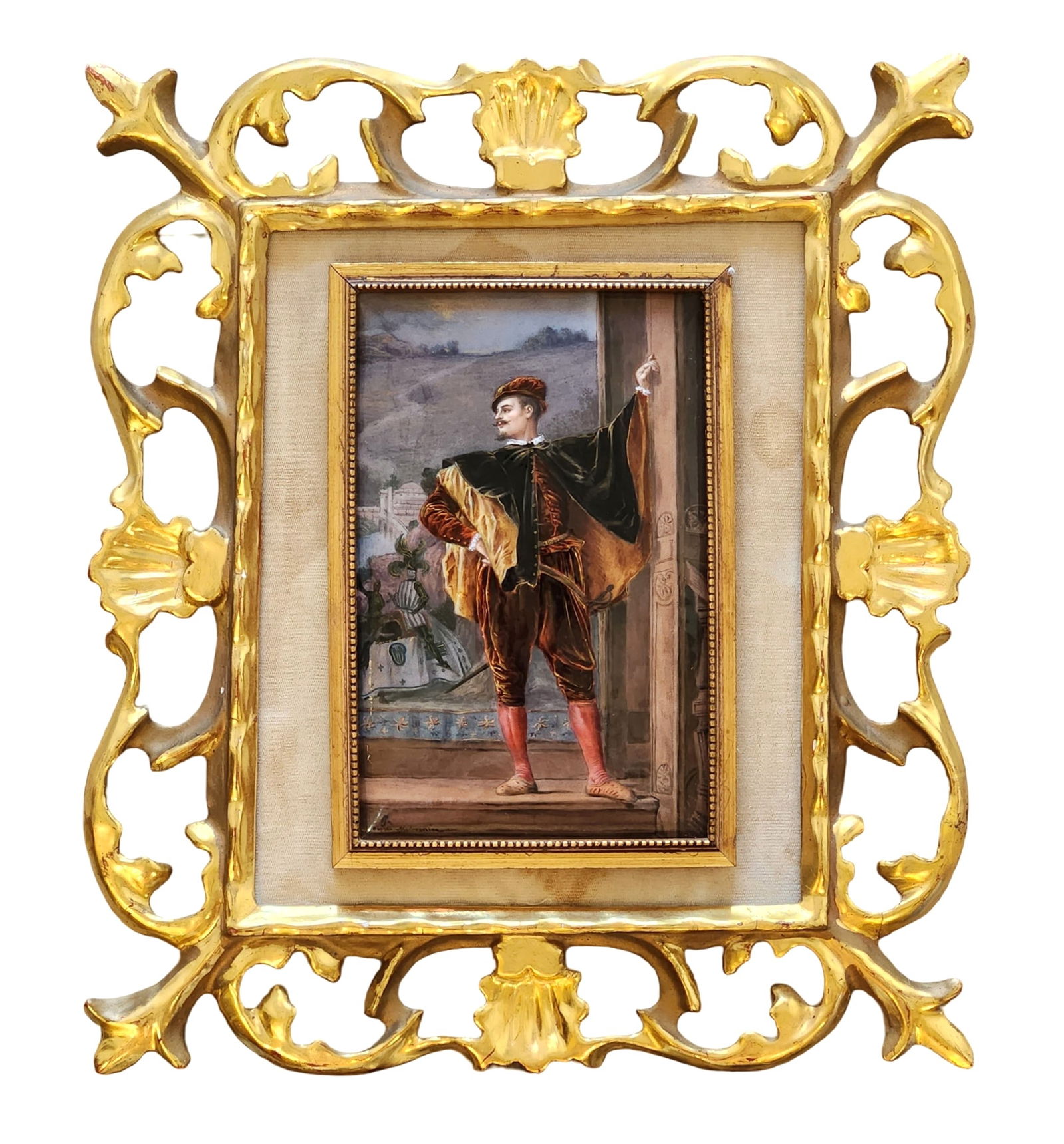 Enamel Plaque Signed Jean-Louis-Ernest Meissonier, in Ornate Gilt Frame: A finely painted enamel plaque signed Jean-Louis-Ernest Meissonier, depicting an elegantly dressed Renaissance figure posed before a scenic backdrop. The miniature is executed with remarkable detail a