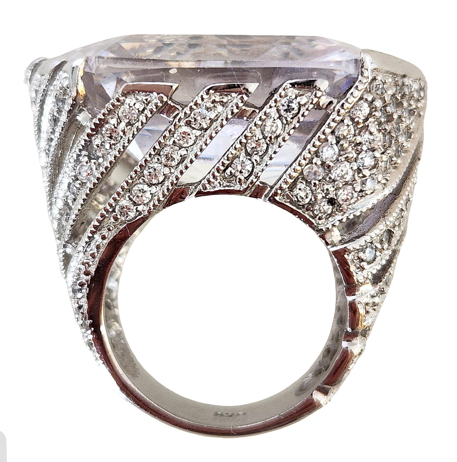 925 Sterling Silver Large Faceted Crystal & Pavé CZ Statement Ring: Elegant 925 sterling silver statement ring featuring a large rectangular faceted clear crystal centerpiece. The stone is elevated above the band and framed by intricate pavé-set cubic zirconia accent