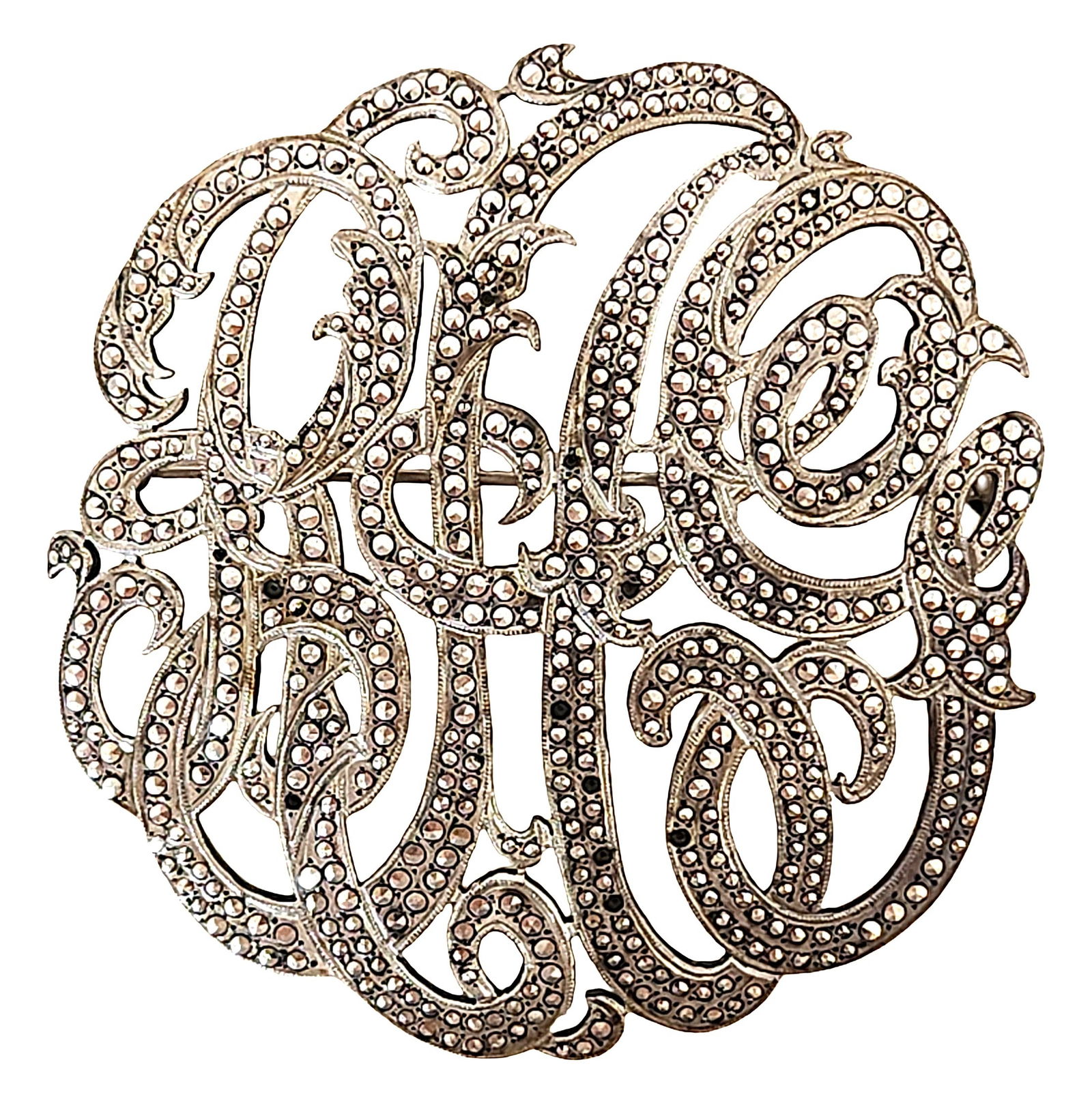 Vintage Sterling Silver Marcasite Script Monogram Brooch: Elegant vintage sterling silver monogram brooch featuring an ornate intertwined script letter design fully set with sparkling marcasite stones. The flowing calligraphic style creates a decorative mono
