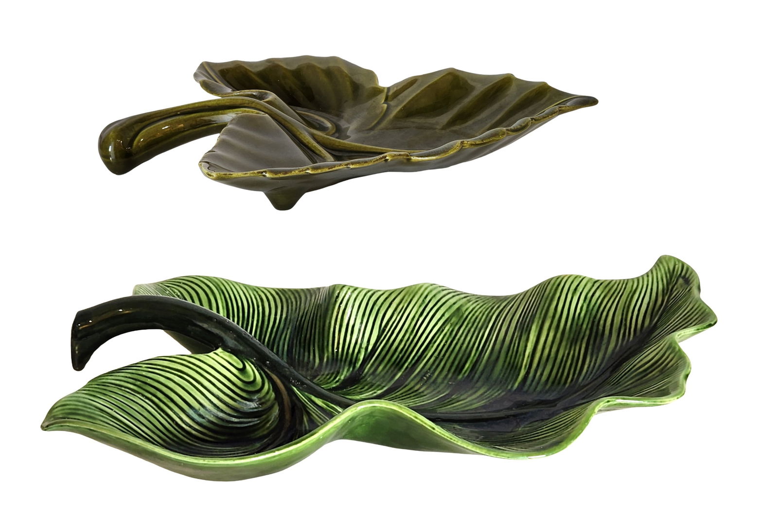 Two Hull Pottery Leaf Form Dishes, Green Drip Glaze, USA: Lot of two mid-century Hull Pottery leaf-form dishes featuring rich green drip glaze decoration. Each dish is molded in the form of a stylized leaf with pronounced veining and sculptural handles that