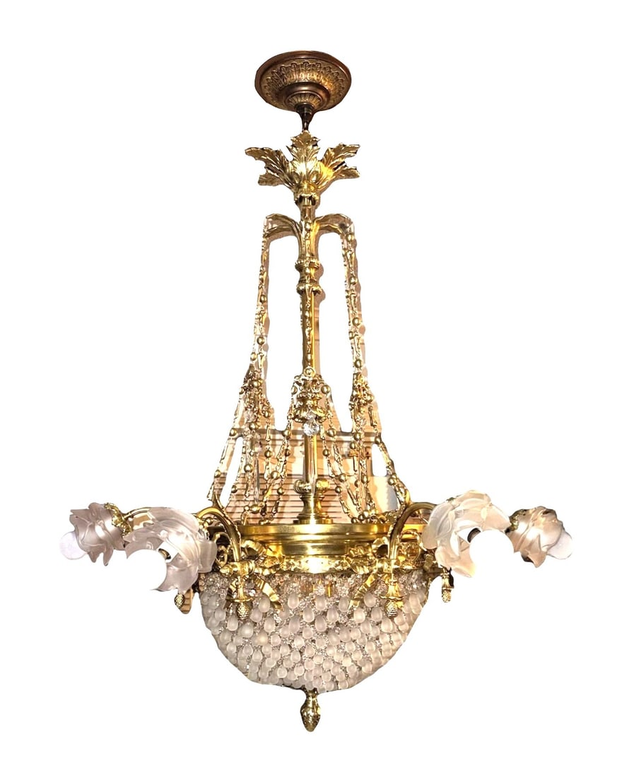 Magnificent French Louis XVI Revival Gilt Bronze & Crystal Basket Chandelier, c. 1890–1910: A superb antique French Louis XVI Revival gilt bronze and crystal chandelier, dating from the late 19th to early 20th century. The fixture features an elegant architectural cage form with finely cast