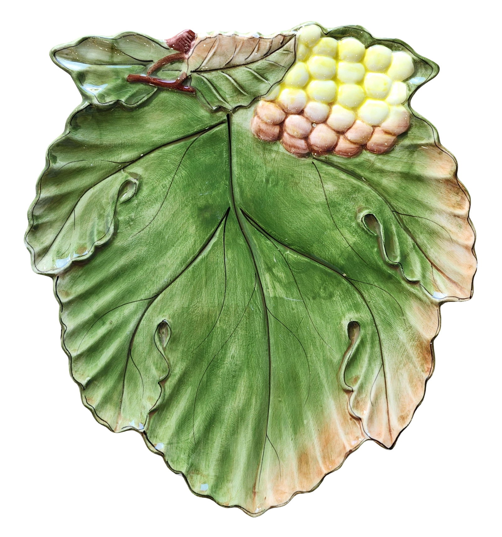 Mann “Frutta Fresca?? Majolica-Style Leaf Form Serving Platter, 1993: Decorative ceramic serving platter from the Mann “Frutta Fresca” collection, designed in the form of a large sculpted leaf with raised fruit decoration. The platter features a richly modeled l