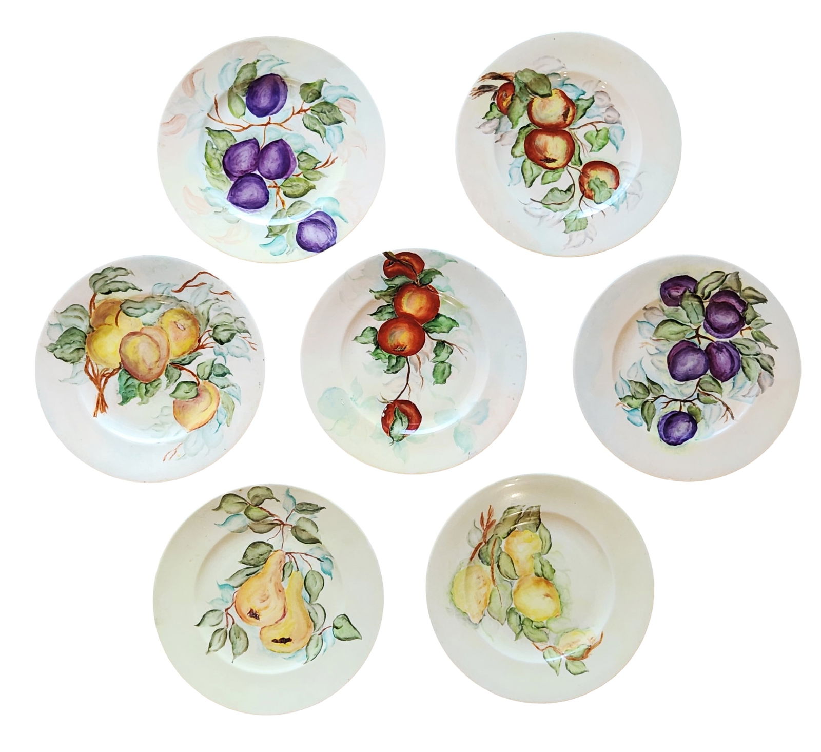 Set of Eight Hand-Painted Fruit Decorated Porcelain Dessert Plates – BHS 1951: A charming set of eight hand-painted porcelain dessert plates, each decorated with colorful fruit motifs including plums, apples, peaches, and pears with leafy branches. The designs are rendered in so