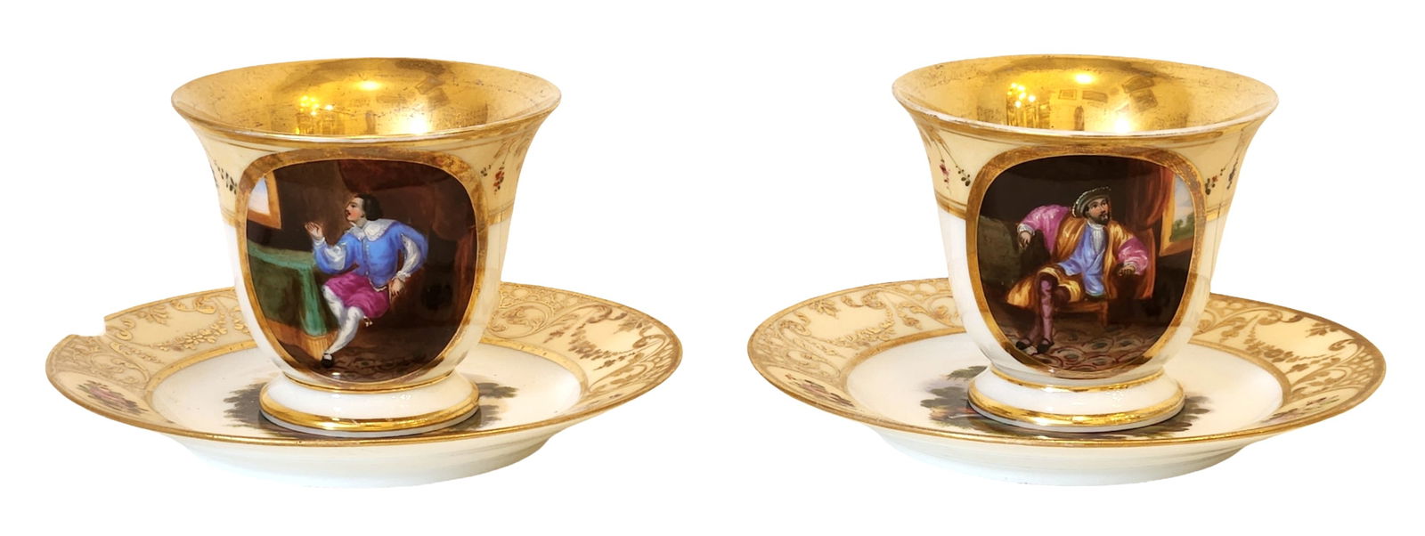 Antique Gilt Porcelain Cup and Saucer with Figural Reserves, 19th Century: Antique porcelain cup and saucer, each decorated with richly gilt borders and hand-painted figural reserve panels depicting male figures in period costume within interior settings. The interiors of th