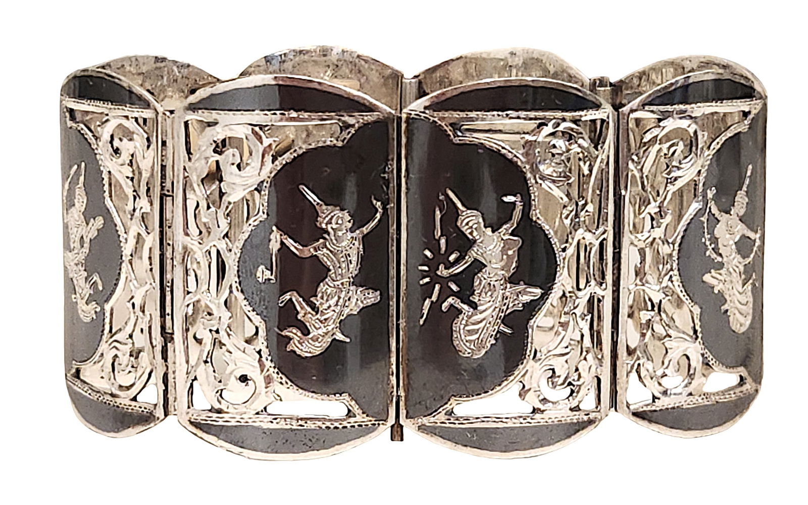 Siam Sterling Silver Panel Bracelet with Enamel Dancer Motifs, Ampargo Sirm: Vintage Siam sterling silver panel bracelet featuring a series of articulated rectangular links, each decorated with traditional Siamese dancer figures set against dark oxidized or enamel-like grounds