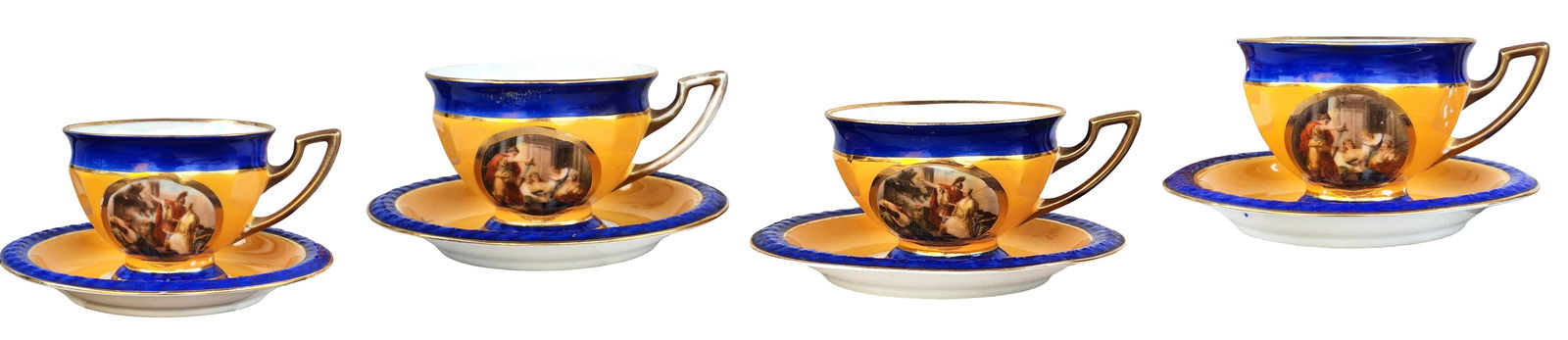 Set of Four Gilt Porcelain Cups and Saucers, P.A.L.T., Czecho-Slovakia: Set of four porcelain cups and matching saucers produced by P.A.L.T. (Porcelanka Adolf Loffler Turnov), Czecho-Slovakia. Each cup is decorated with a cobalt blue border, extensive gilt detailing, and