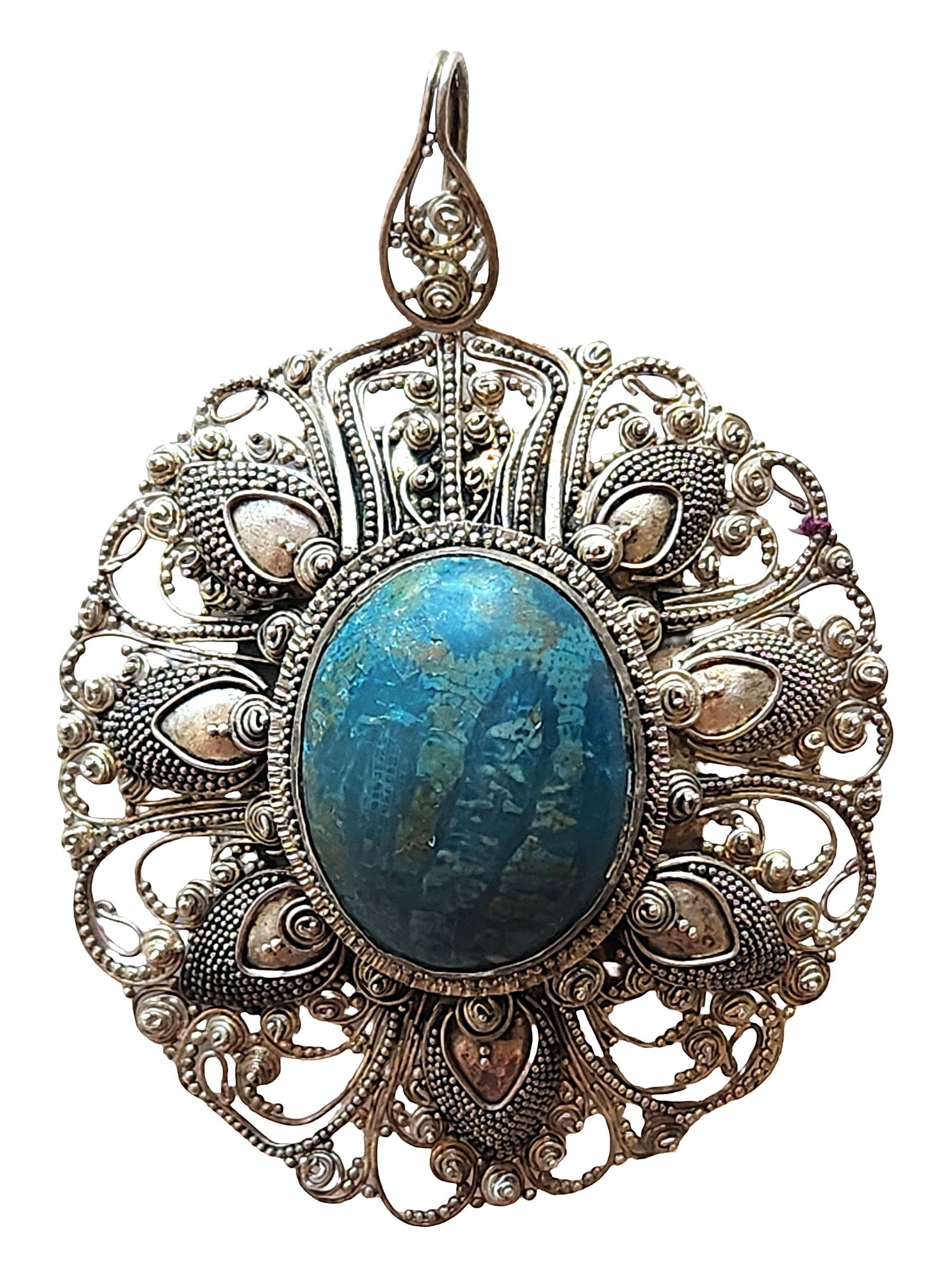 Large Sterling Silver Filigree Pendant with Blue Cabochon Stone: Large decorative pendant crafted in sterling silver featuring elaborate filigree and granulation work. The pendant is centered with an oval blue cabochon stone displaying natural mottling and tonal va