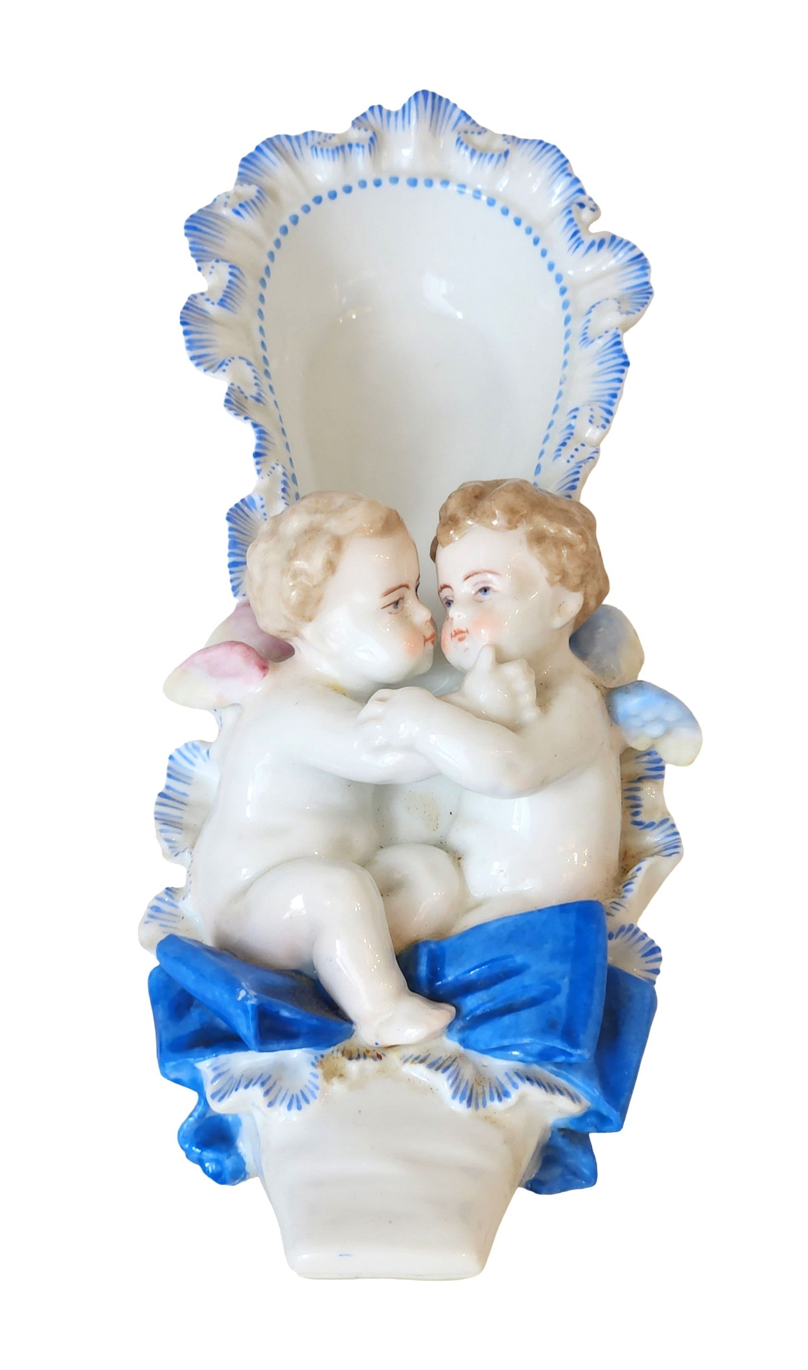 Meissen Porcelain Shoe with Cherubs, Possible 19th Century: Charming Meissen porcelain figural shoe, finely modeled and hand-painted with two seated cherubs in embrace, resting against a ruffled back painted with cobalt-blue highlights. The high-heeled shoe fo