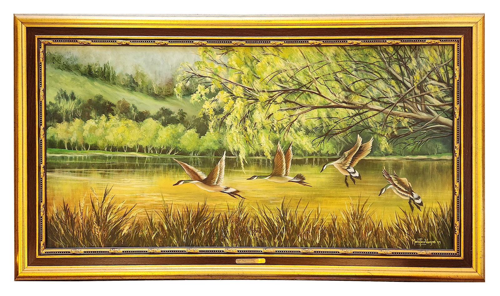 Ma. Cristina Vargas (1999) Ducks in Flight Landscape Oil Painting, Framed: Oil on canvas landscape painting by Ma. Cristina Vargas, signed and dated 1999 lower right. The composition depicts a tranquil lakeside setting with lush green hills and trees in the background, a ref