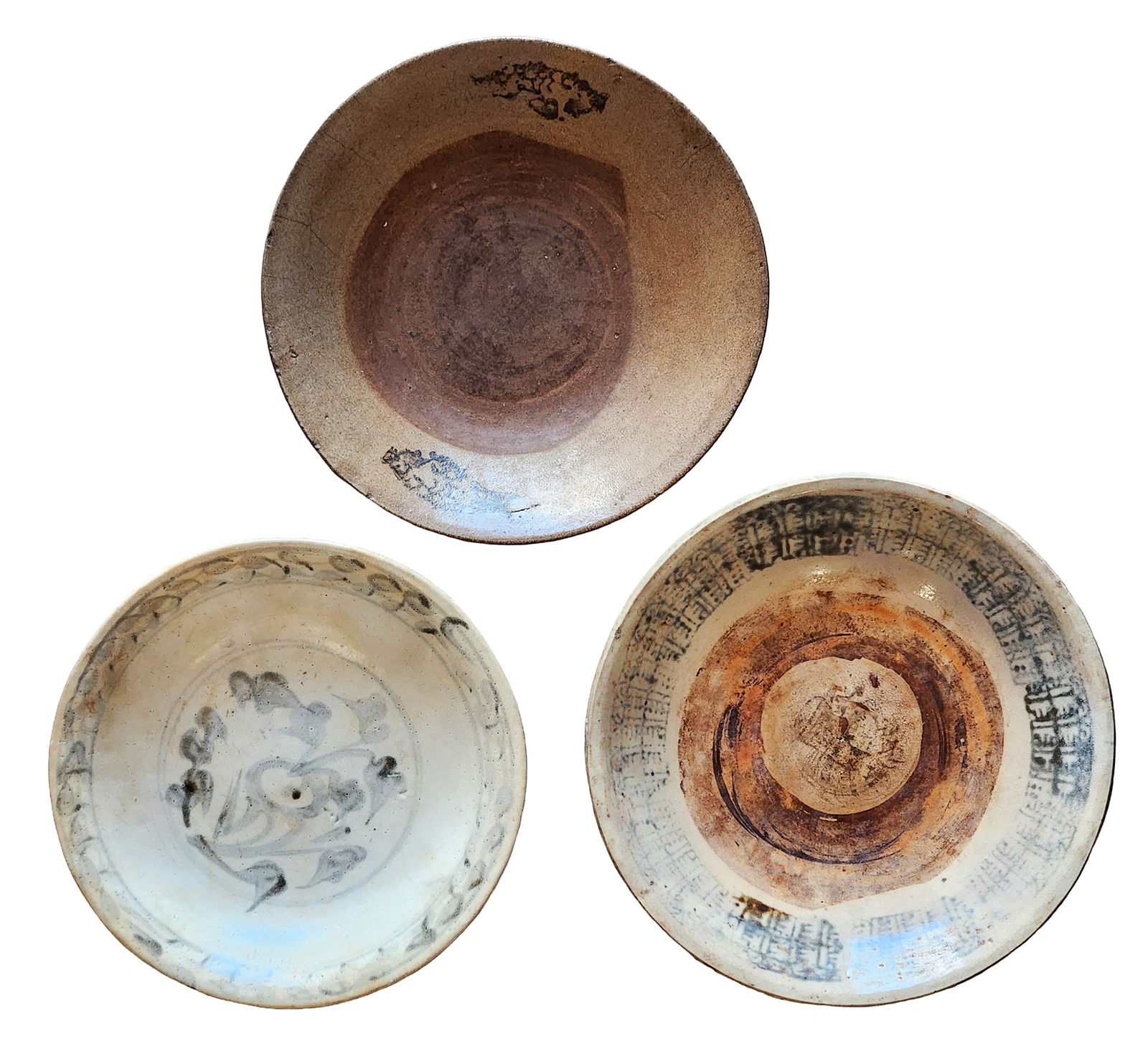 Group of Three Antique Asian Stoneware Bowls: A group of three antique Asian stoneware bowls featuring traditional hand-thrown forms and hand-painted decoration. Each bowl displays distinct glazing and brushwork typical of utilitarian pottery use