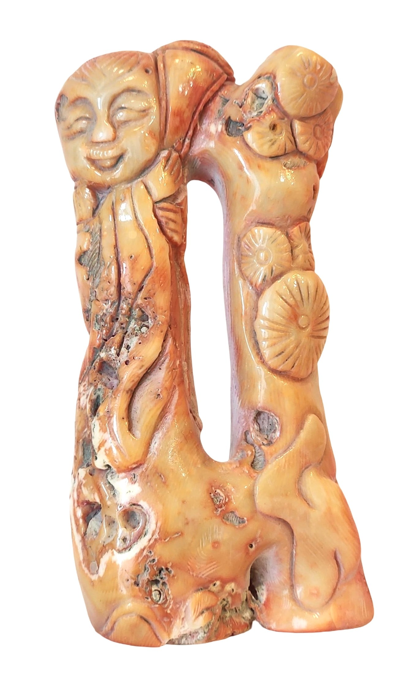 Antique Carved Red Coral Figure of a Laughing Immortal, Mid-20th Century: A Mediterranean red coral carving depicting a laughing immortal, worked from a natural coral branch. The figure is finely detailed with flowing robes and an expressive smiling face. The warm coloratio