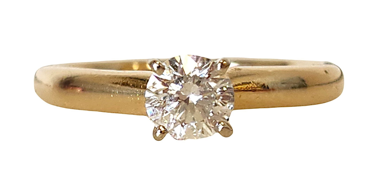 Vintage 14K Gold Solitaire Diamond Ring – Classic Engagement Ring (M.B. Mark): Classic 14K yellow gold solitaire diamond ring featuring a brilliant round-cut diamond set in a traditional four-prong setting. The clean, timeless design highlights the sparkle of the center stone an