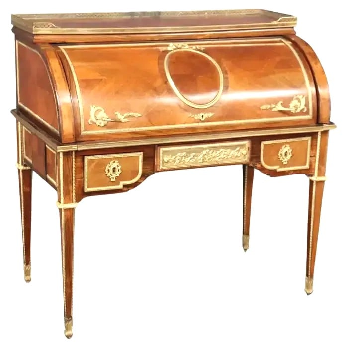 French Late 19th Century Ormolu Mounted Bureau Cylindre After 1874 Model by Jean-Henri Riesener: A French late 19th century ormolu-mounted, amaranth, mahogany, sycamore, marquetry and parquetry bureau cylindre, after the 1784 model by Jean-Henri Riesener (1734 - 1806) Measure 43 3/4"in H x 44 1/4