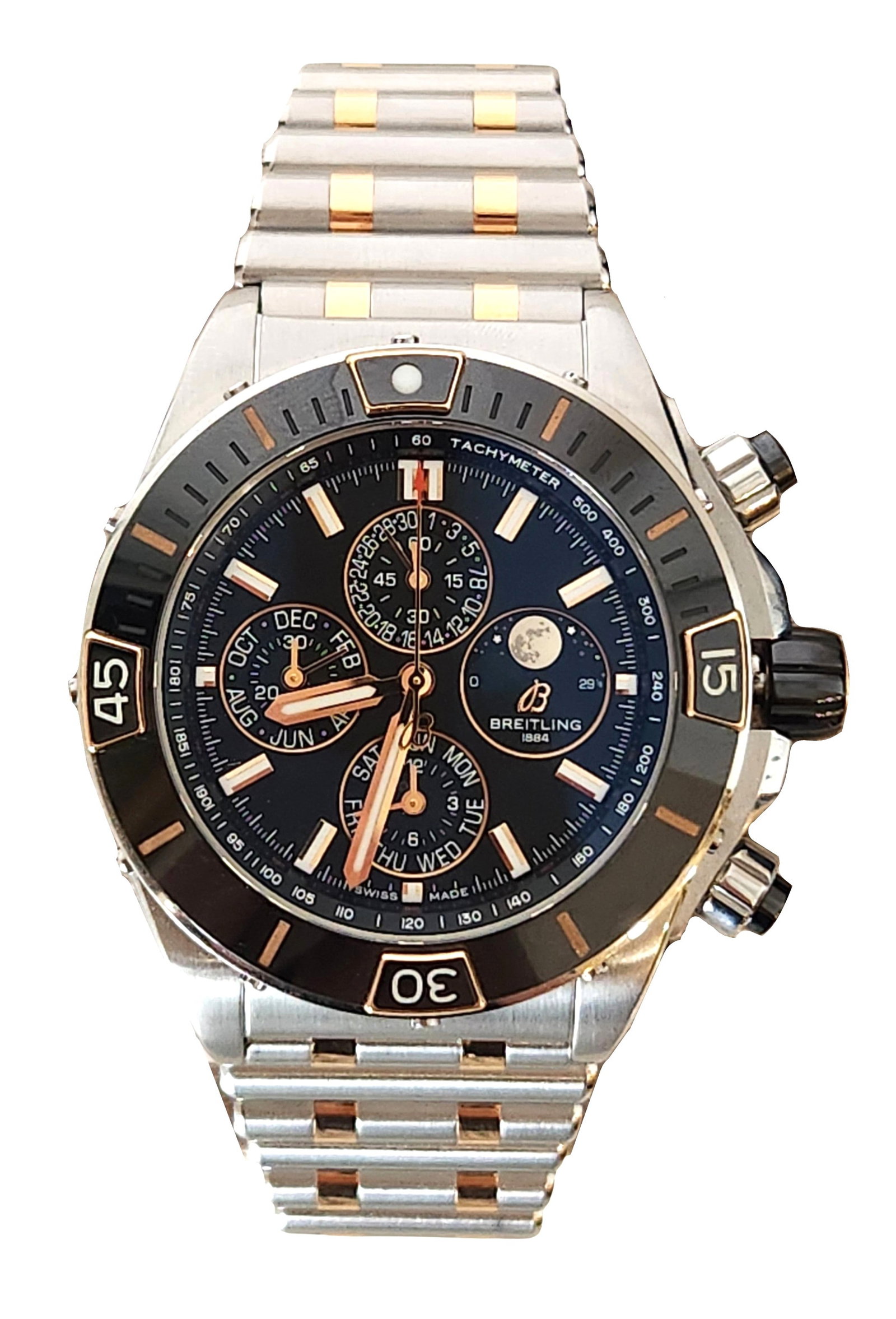 Breitling Super Chronomat Moon Face 44 Two-Tone Chronograph Wristwatch Ref. I19320: Breitling Super Chronomat Moon Face 44 men?s wristwatch, reference I19320, featuring a stainless steel and rose gold two-tone case and bracelet. The watch has a dark dial with luminous baton hour mark