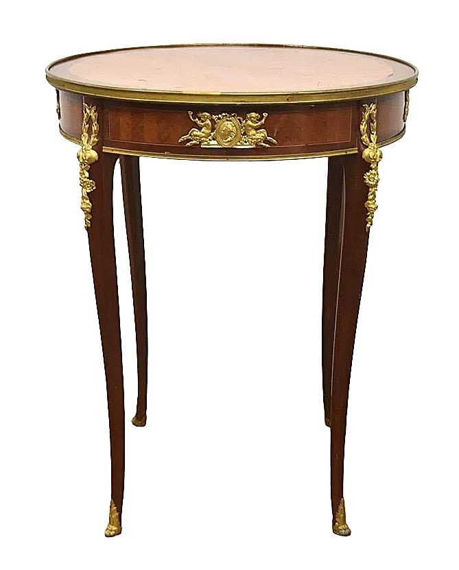 Fine French Louis XVI - Style Marquetry Occasional Table with Gilt Bronze Mounts, Late 19th Century: A fine French Louis XVI–style occasional table, dating to the late 19th century, of elegant circular form. The table features a book-matched parquetry and marquetry top with radiating geometric desi