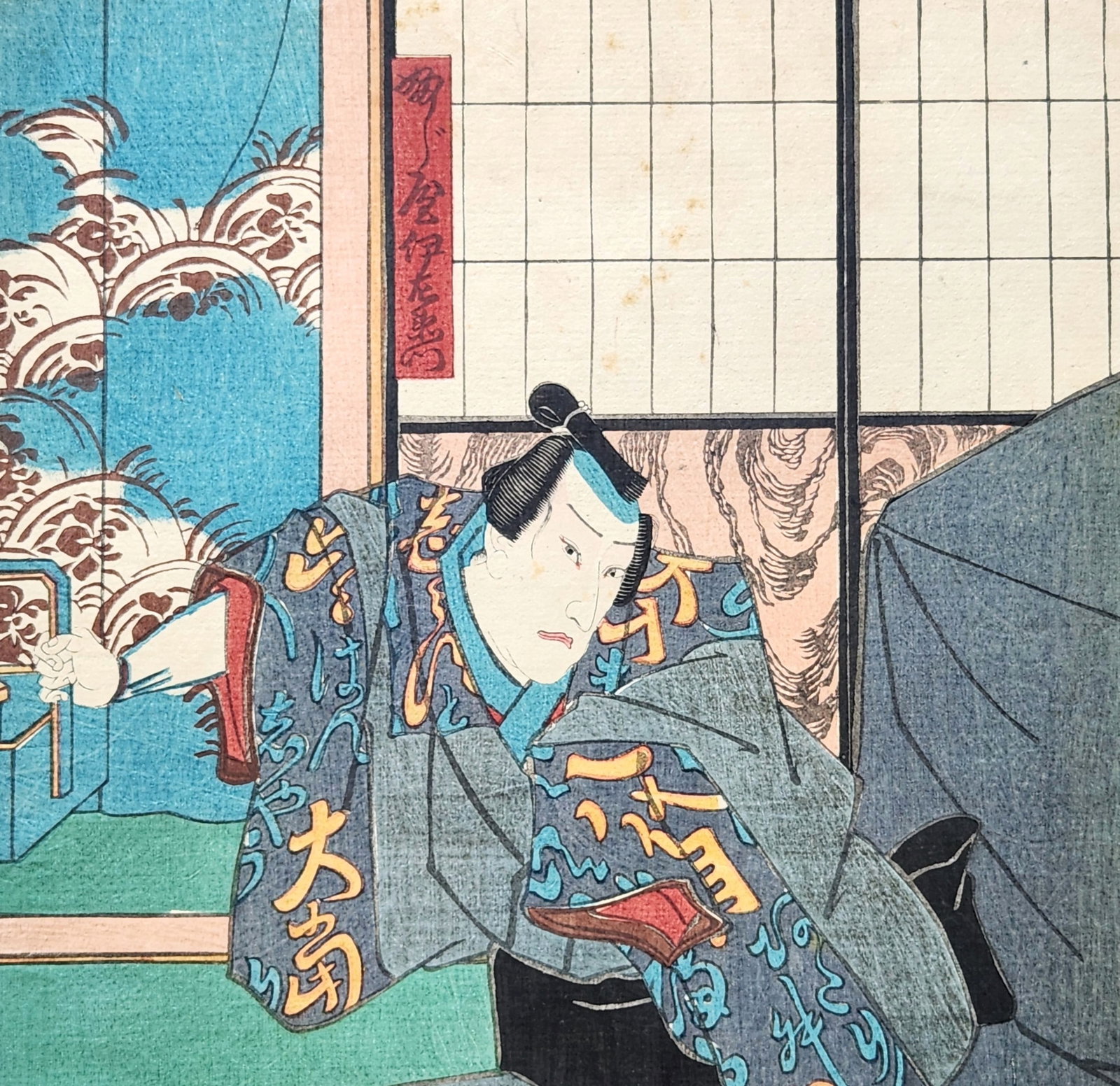 Japanese Ukiyo-e Kabuki Actor Woodblock Print, Utagawa Kunisada (Toyokuni III): A Japanese Ukiyo-e woodblock print depicting a dramatic Kabuki actor in motion inside a traditional interior setting. The figure is shown in a dynamic pose, leaning forward with one arm extended, dres