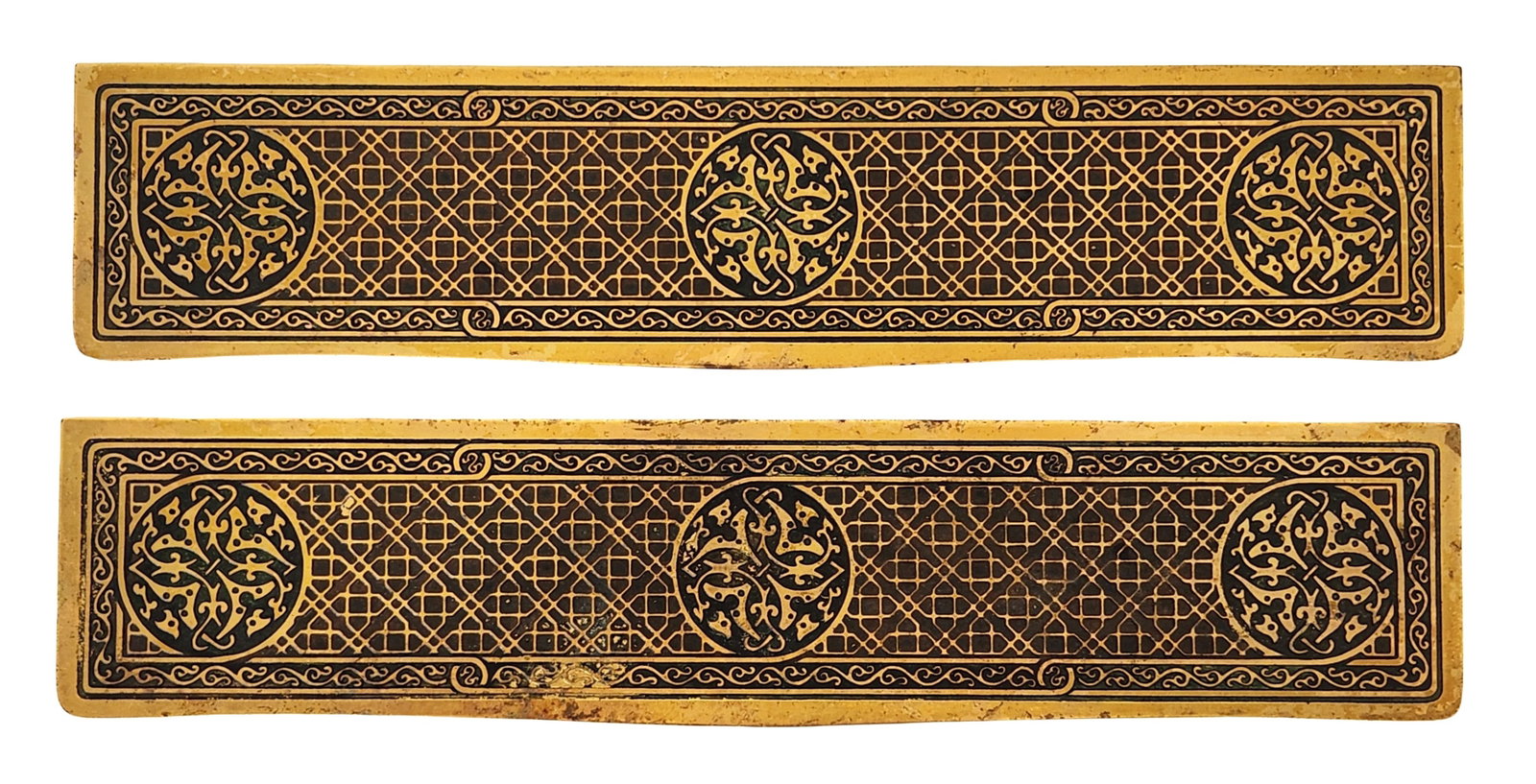 Pair of Tiffany Studios New York Bronze Desk Blotter Ends, Pattern No. 2020, Early 20th Century: A matched pair of Tiffany Studios, New York bronze desk blotter ends (or paperweights), each cast in a rectangular form and decorated with an elegant repeating geometric and foliate motif in the firm?