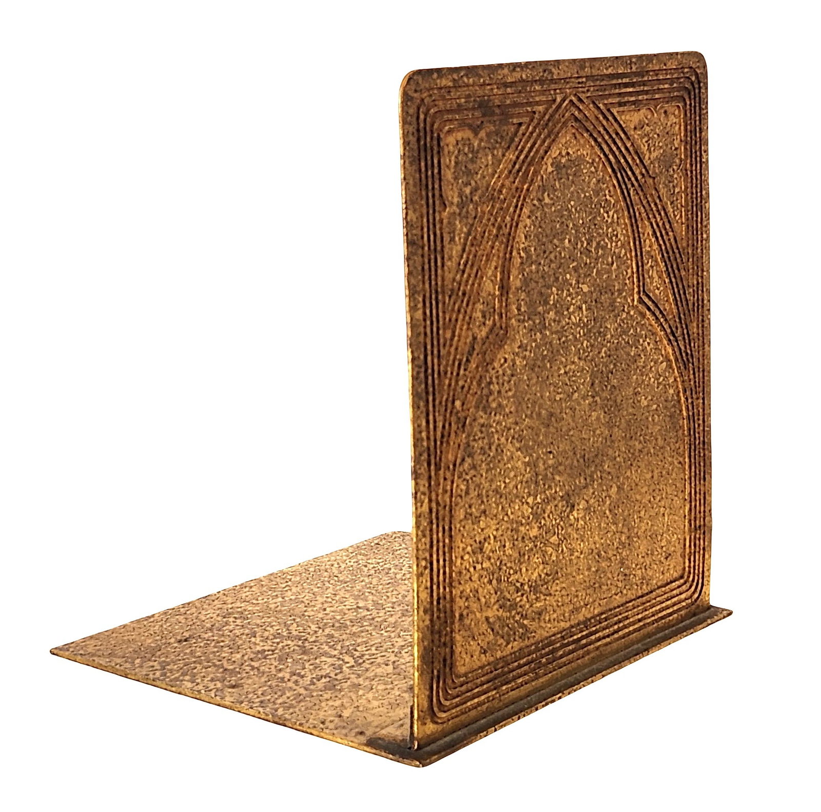 Tiffany Studios New York Bronze Bookend, Gothic Arch Pattern No. 1807, Early 20th Century: A classic Tiffany Studios, New York bronze bookend executed in the firm?s distinctive Arts & Crafts style, featuring a stylized Gothic arch motif in low relief The design is characterized by layered, 