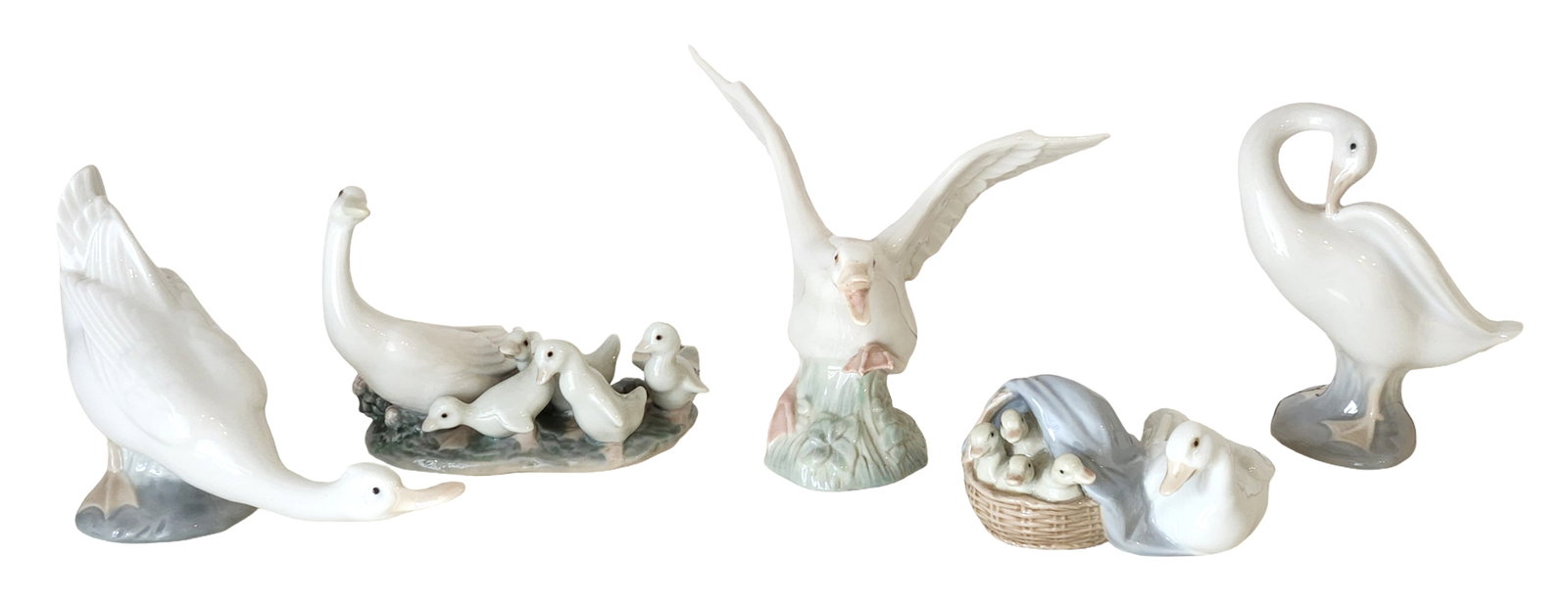 Lot of 5 Lladro & Nao Porcelain Duck and Goose Figurines, Spain: Group of five Spanish porcelain bird figurines by Lladr? and Nao (by Lladr?), comprising ducks and geese in various naturalistic poses. The lot includes examples of standing, nesting, and wing-spread 