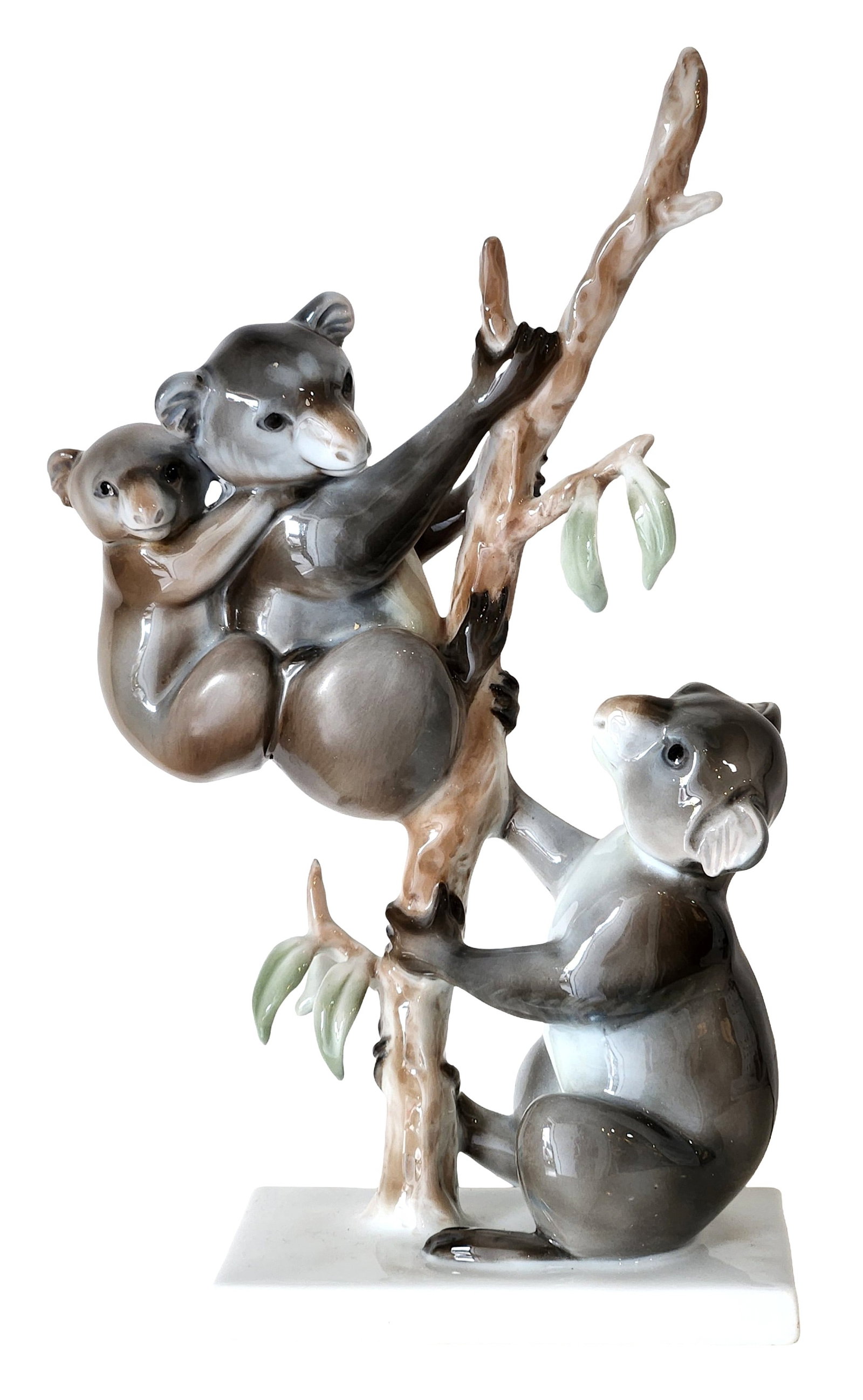 Rosenthal "Koalas in Tree" Porcelain Figurine ? Limited Edition (1567/6000): Charming hand-crafted porcelain group depicting a mother koala with her joey perched on a tree branch, accompanied by another koala climbing below. Beautifully modeled with soft naturalistic shading i