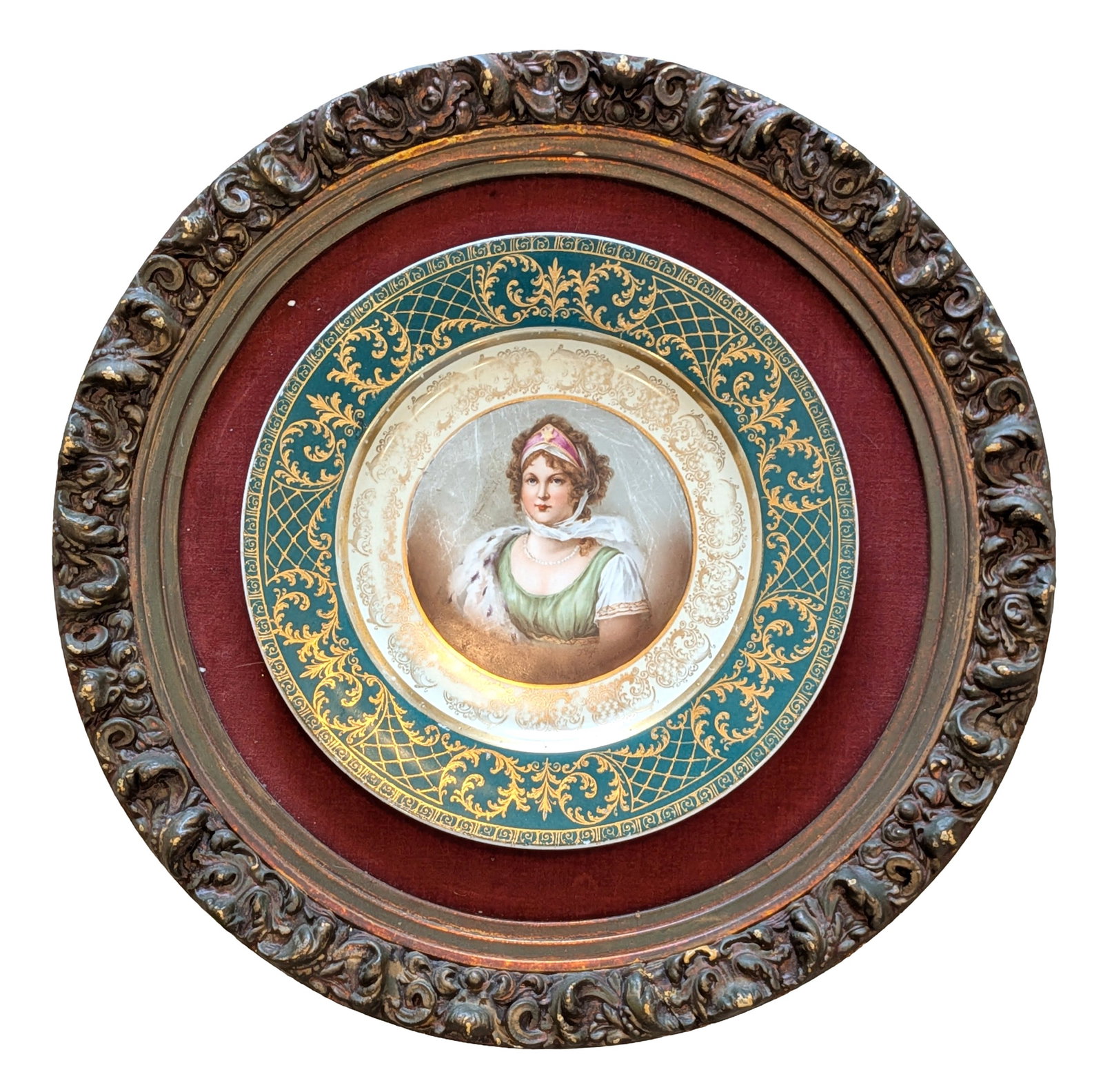 Royal Vienna Style Hand-Painted Framed Portrait Plate: Beautiful Royal Vienna style porcelain portrait plate featuring a finely hand-painted image of a young lady in Regency-era dress. She wears a green gown, pearl necklace, and fur wrap, with a delicate 