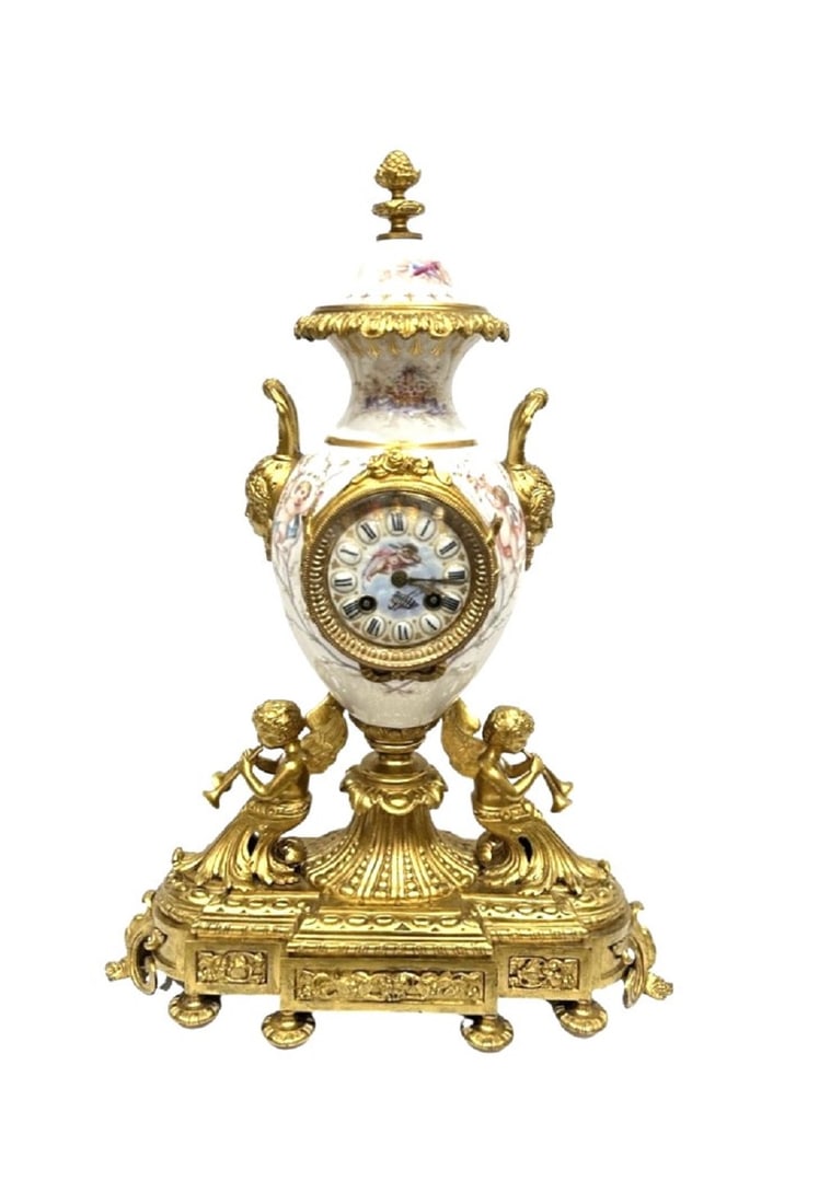 Possible Final of the 19th Century French Sevres Style Figural Putti Clock: Possible Final of the 19th Century French Sevres Style Figural Putti Clock Measure 21"in H x 15 1/2"in W x 5 1/2"in D