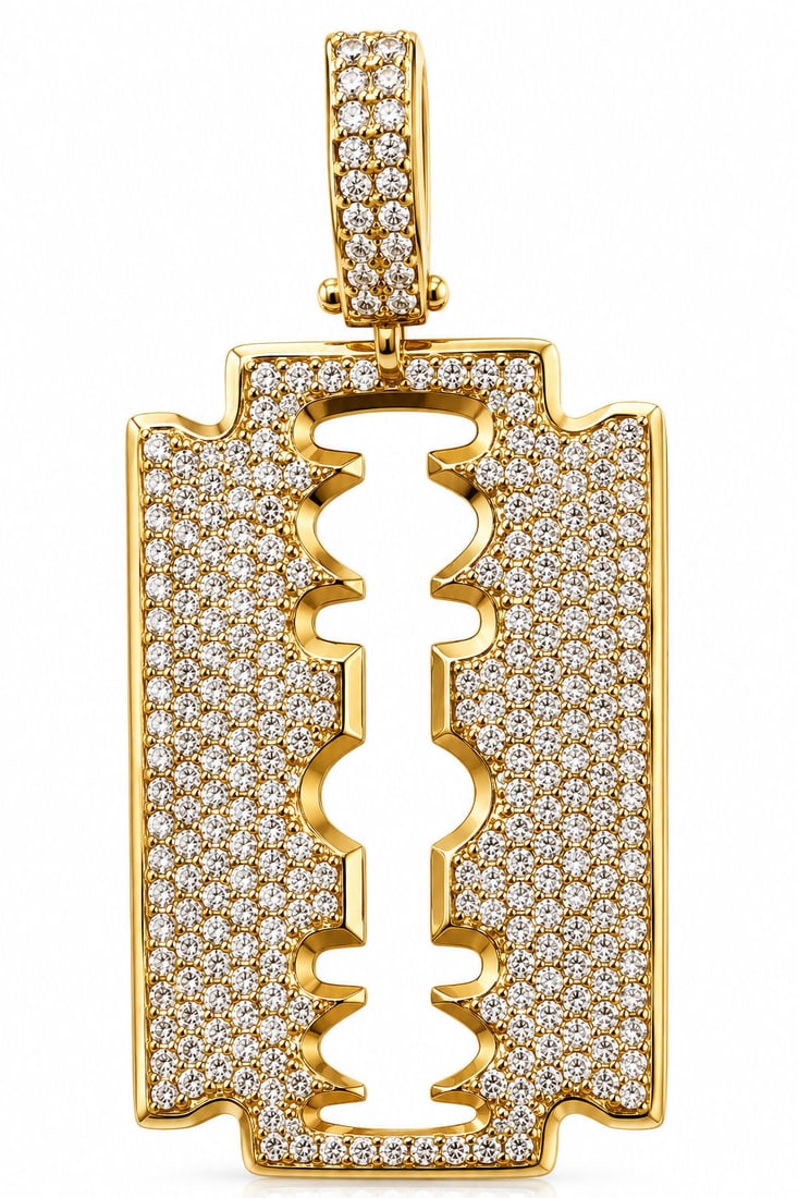 14KT Yellow Gold Diamond Razor Blade Pendant ? 3.31CT: Bold and highly detailed razor blade pendant crafted in solid 14KT yellow gold and fully pav? set with brilliant round diamonds totaling approximately 3.31 carats. The iconic razor blade silhouette gi